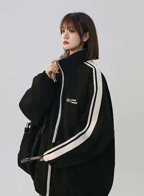 Schwarze, gestreifte Oversize-Trainingsjacke