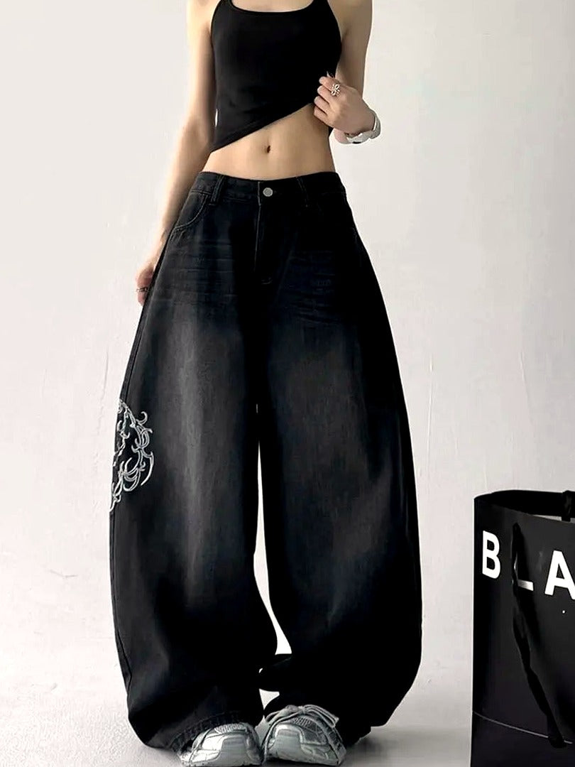 Midnattsrundade broderade jeans
