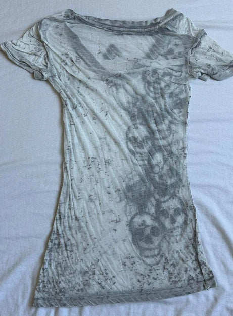 Kuslig kaskad-dödskalletopp