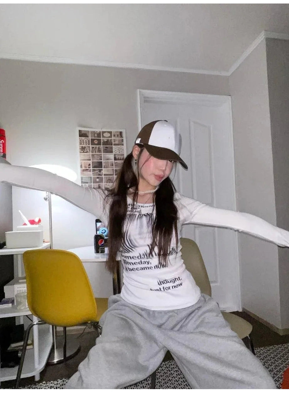 Distorted Text Print Long Sleeve Top