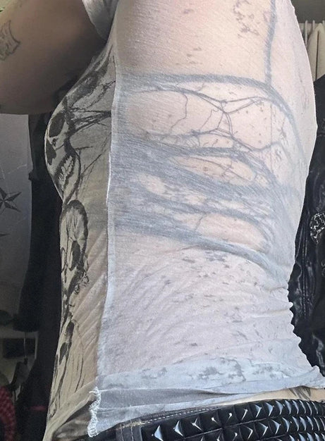 Kuslig kaskad-dödskalletopp