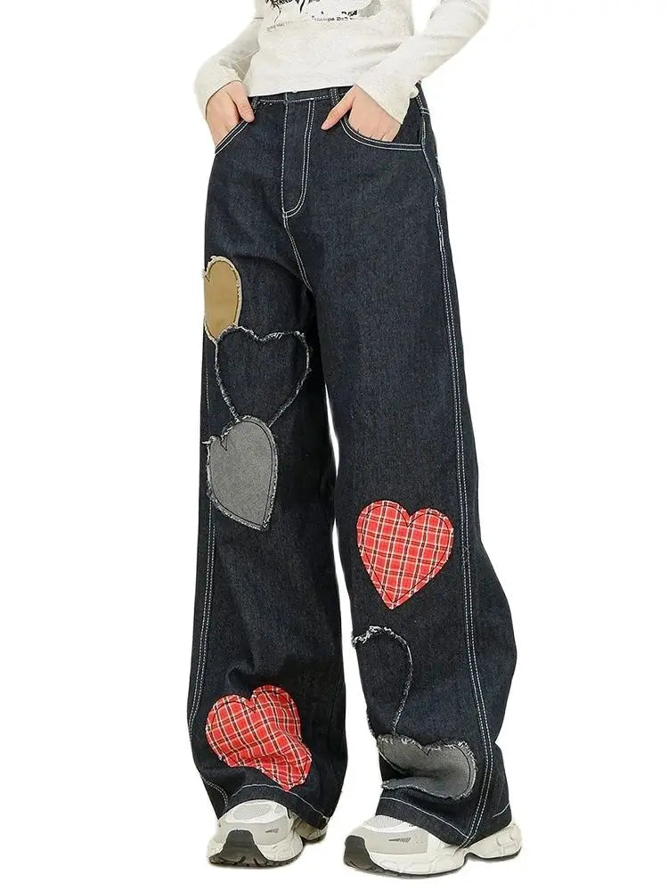 Denimhose mit Patchwork-Herzen