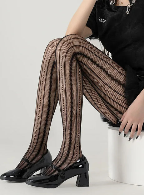 Strumpfhose mit scharlachrotem Spitzenmuster