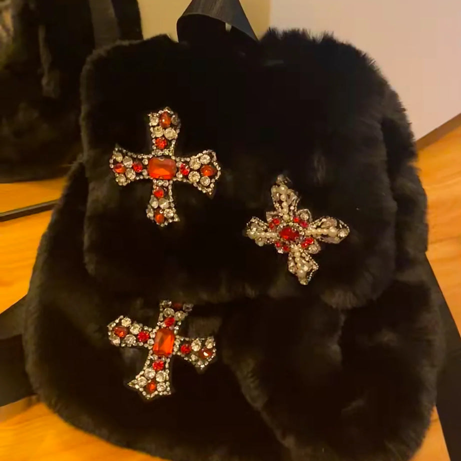 Velvet Sin Fuzzy Cross Backpack