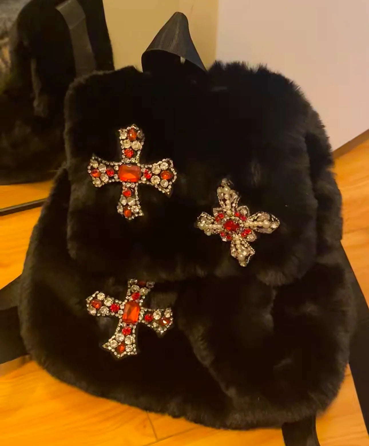 Velvet Sin Fuzzy Cross Backpack