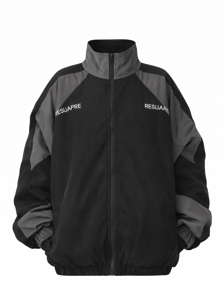 Zweifarbige, übergroße Windjacke